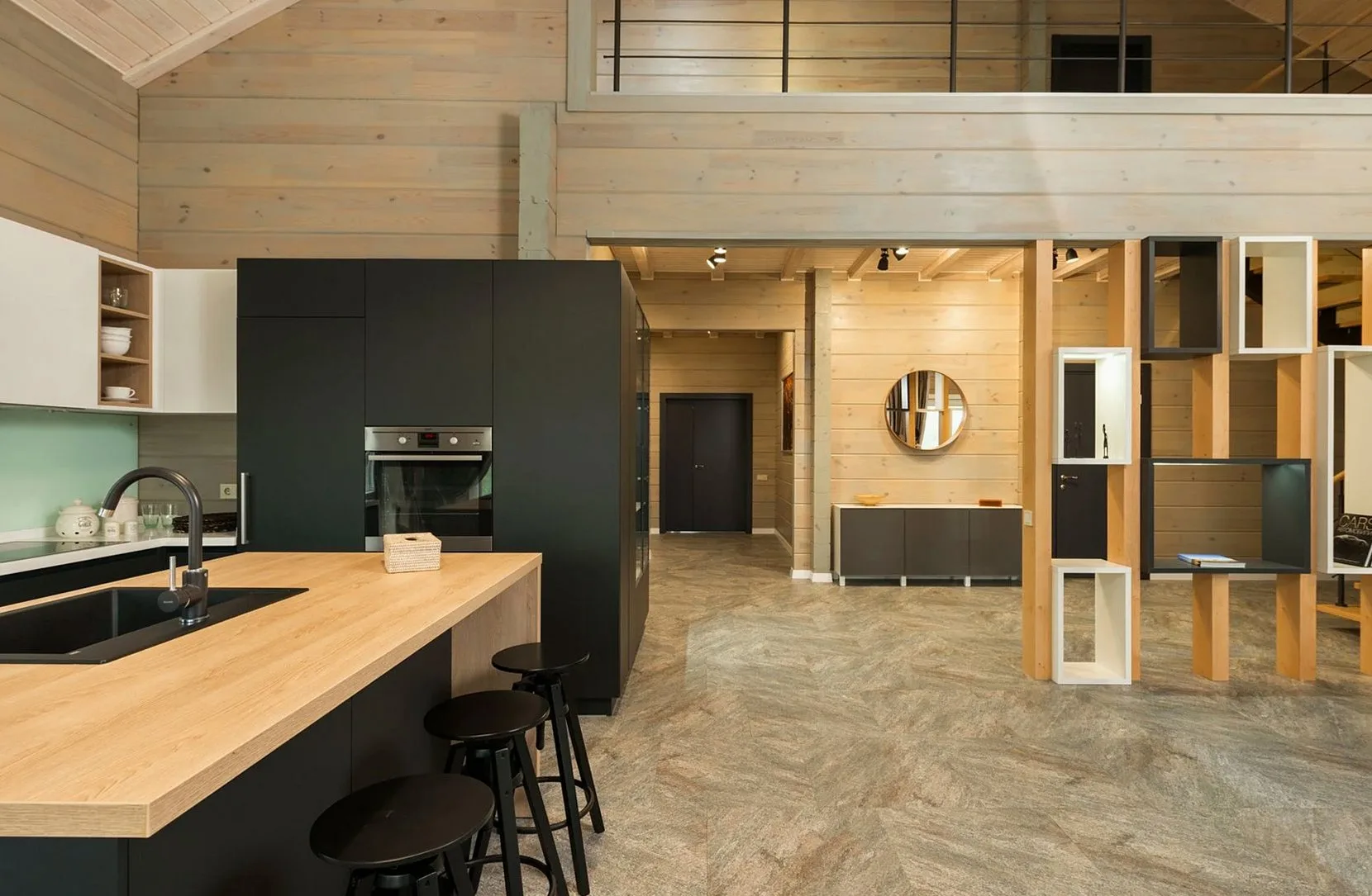 Interior design of modern kitchen with matte cupboards and built in appliances in minimalist spacious private house